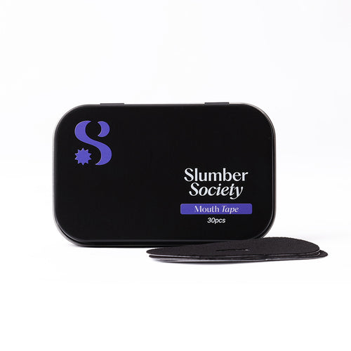 Mouth Tape tin on its side showing branding with loose mouth tape pieces lying in front of the tin.