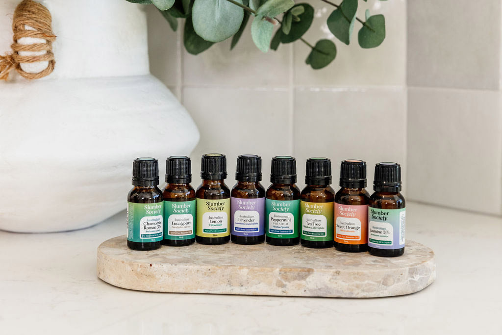 Slumber Society Australian sourced essential oils. 8 x 15ml bottles in a row.